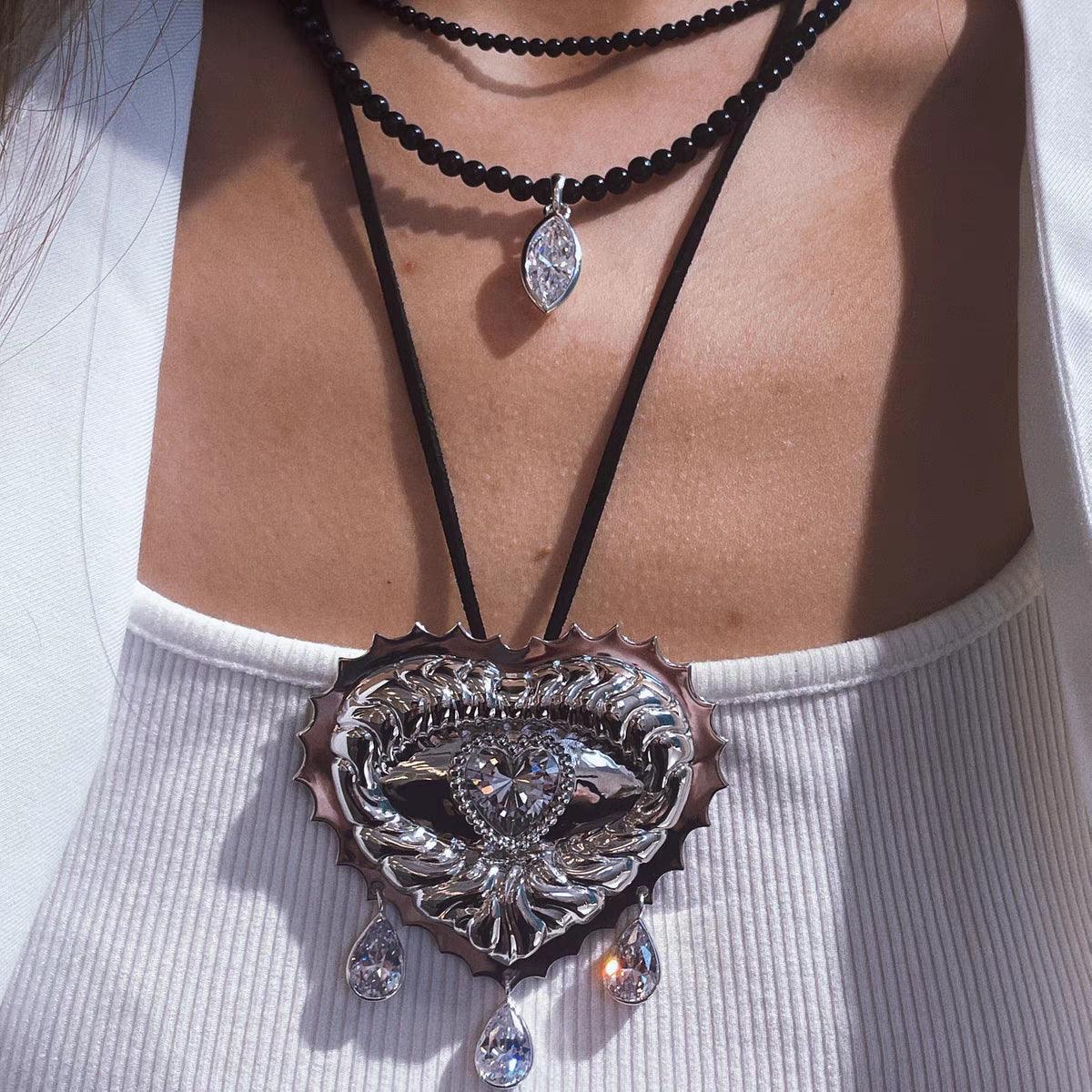 Heart Crystal Eye Sun Embossed Brooches Or pendants Two Usages - Uniqvibe